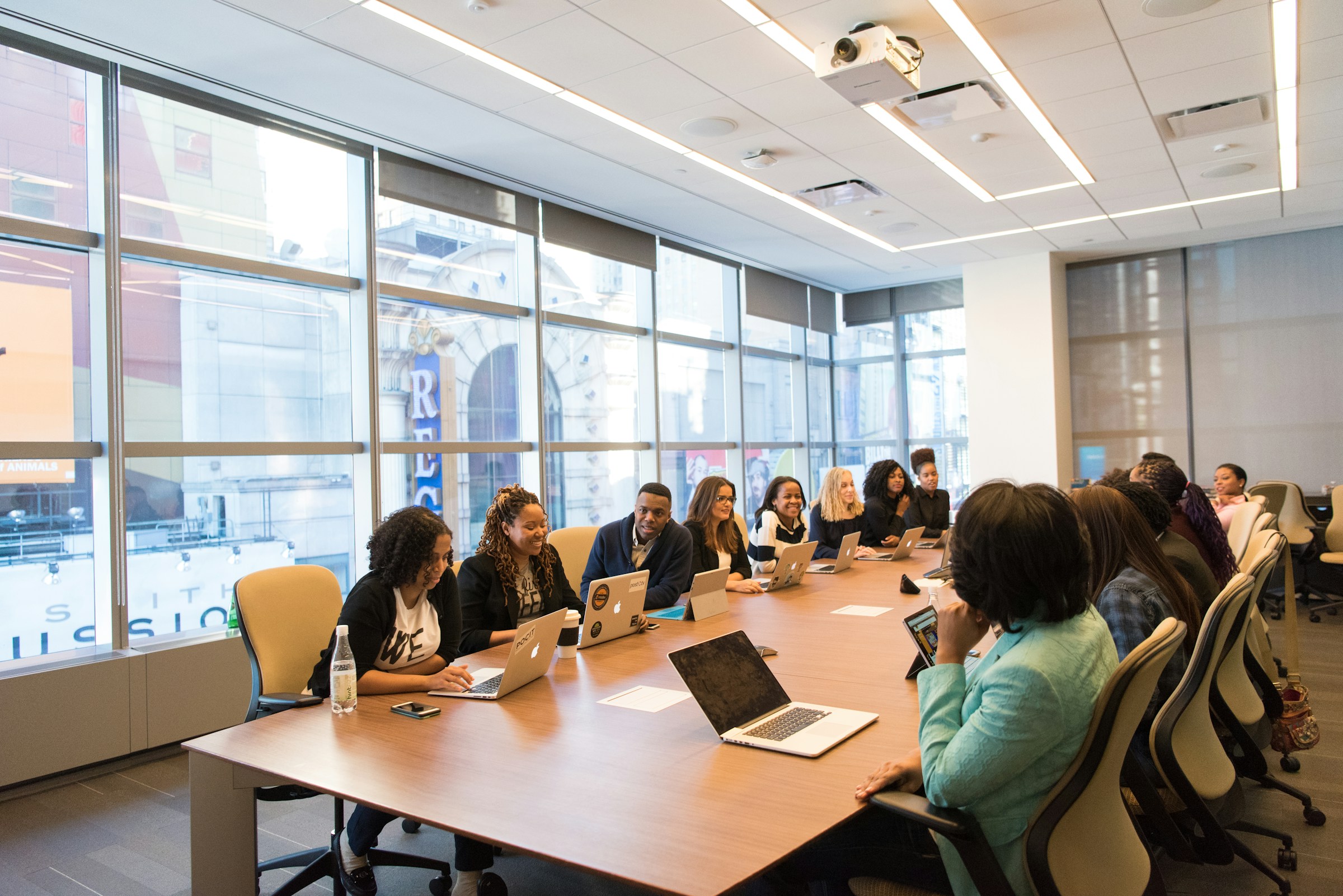 The QuickCred team in a meeting